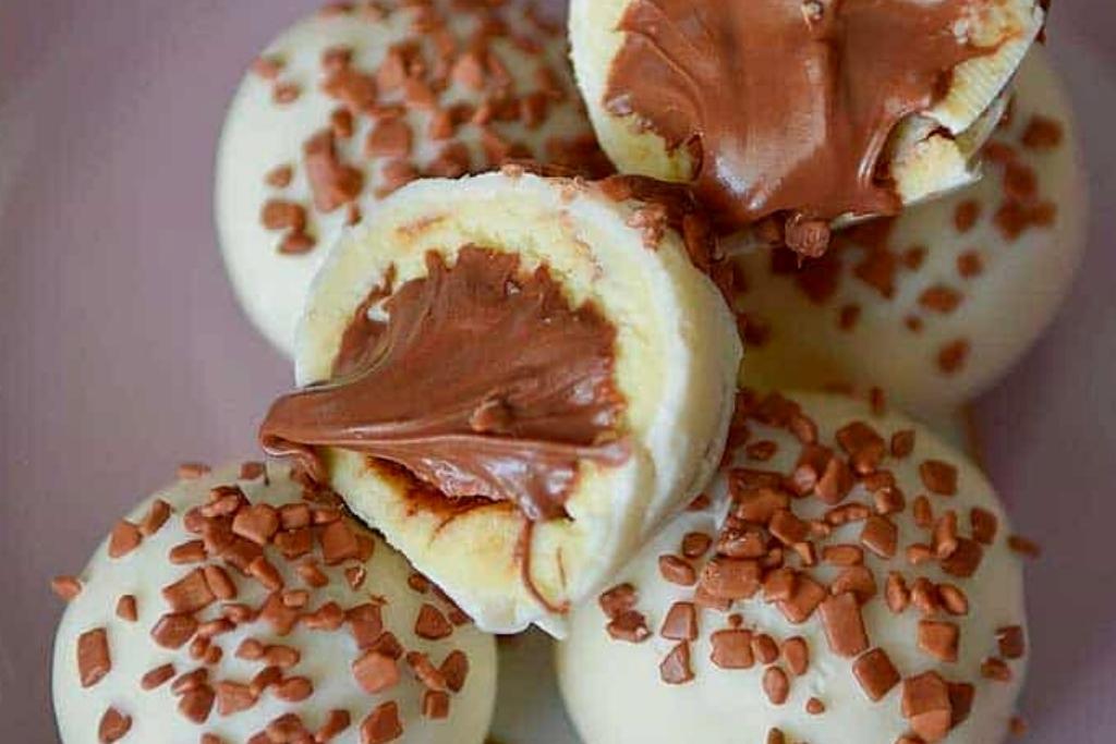 Bombom de leite ninho com nutella, impossível resisti a essa gostosura Bombom de leite ninho com nutella, impossível resisti a essa gostosura